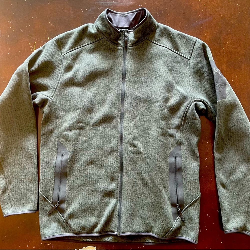 Arc’teryx green zip up in large.